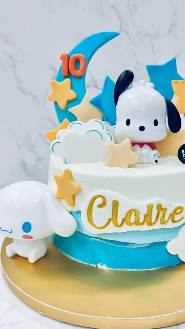 Blue and white puppy themed birthday cake