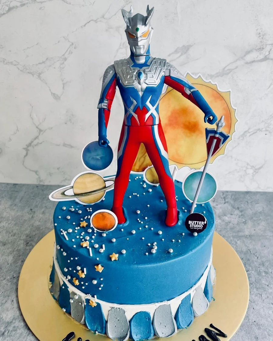 Ultraman themed blue birthday cake