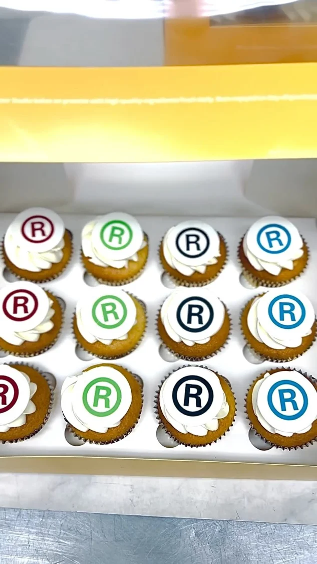 Branded cupcakes in a yellow gift box
