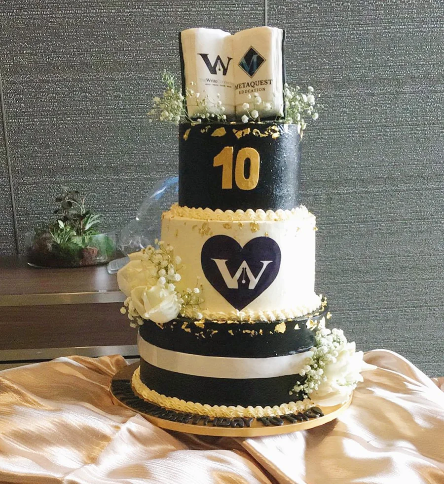 Black and gold tenth anniversary cake