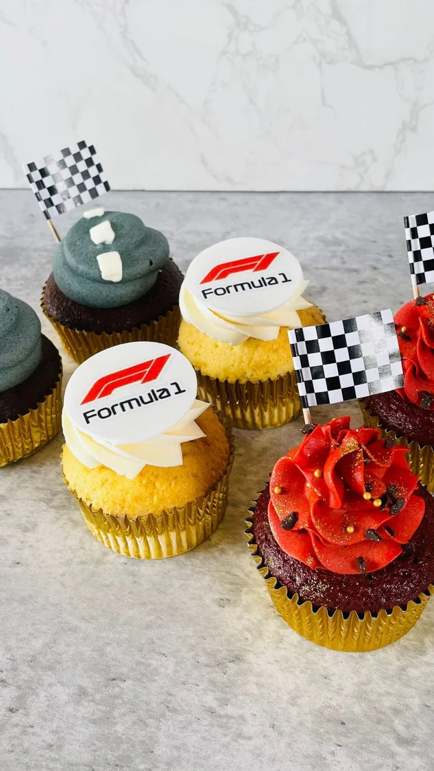 Branded cupcakes with red and white decorations