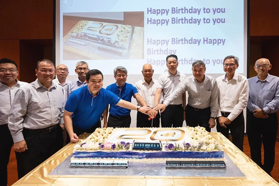 Large rectangular cake at a corporate celebration