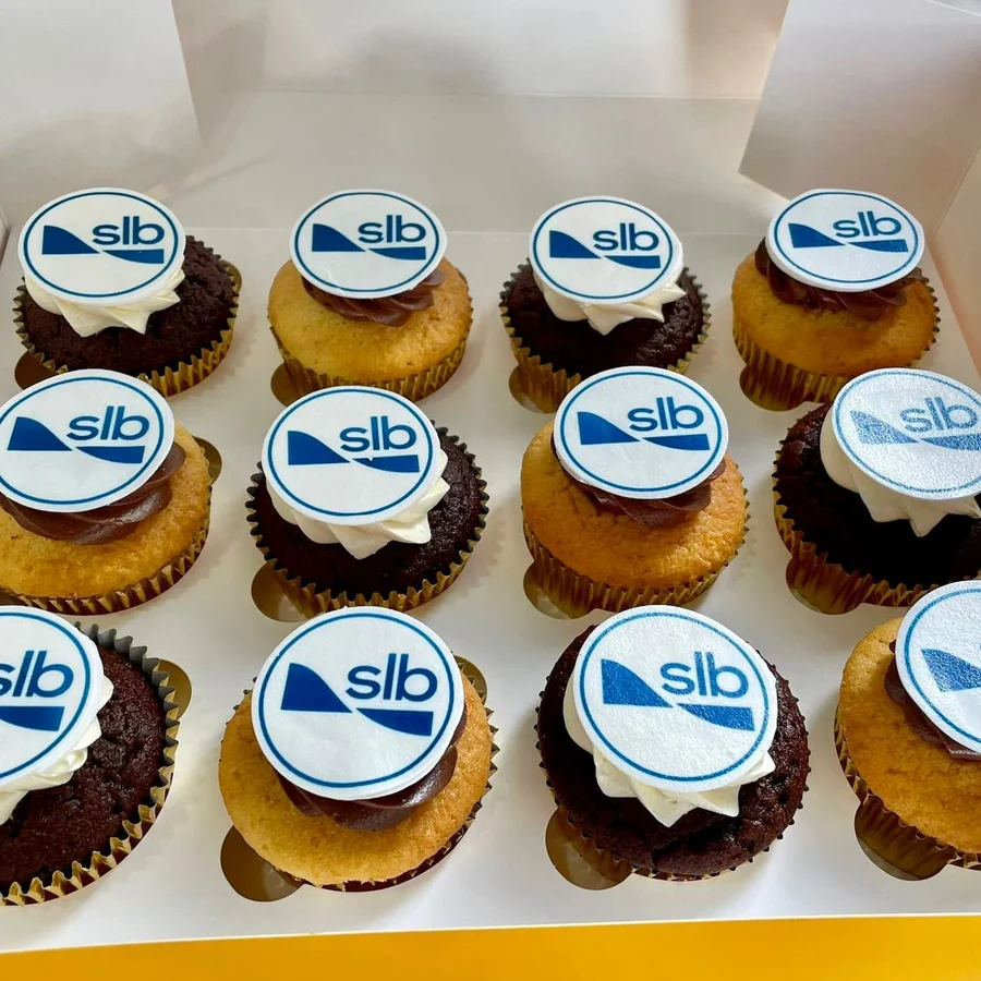 Blue and white branded cupcakes