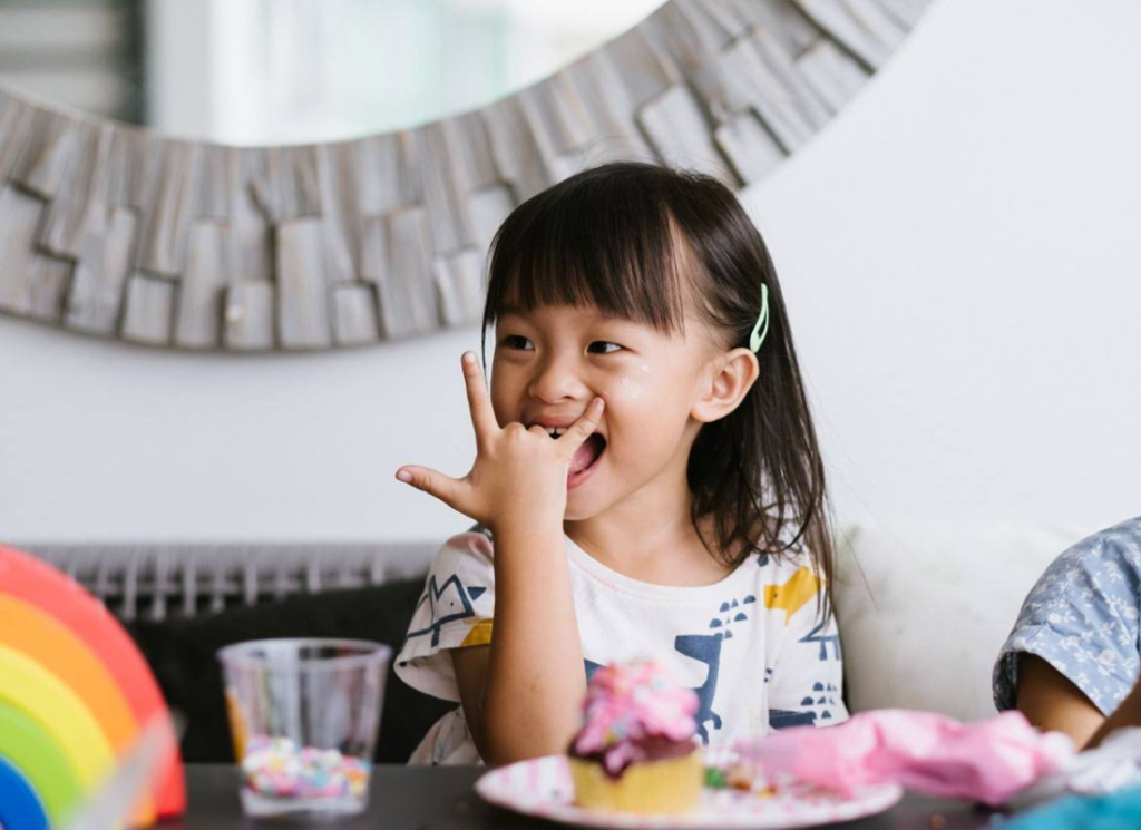 Happy Kid Eating Cupcakes By Butterstudio